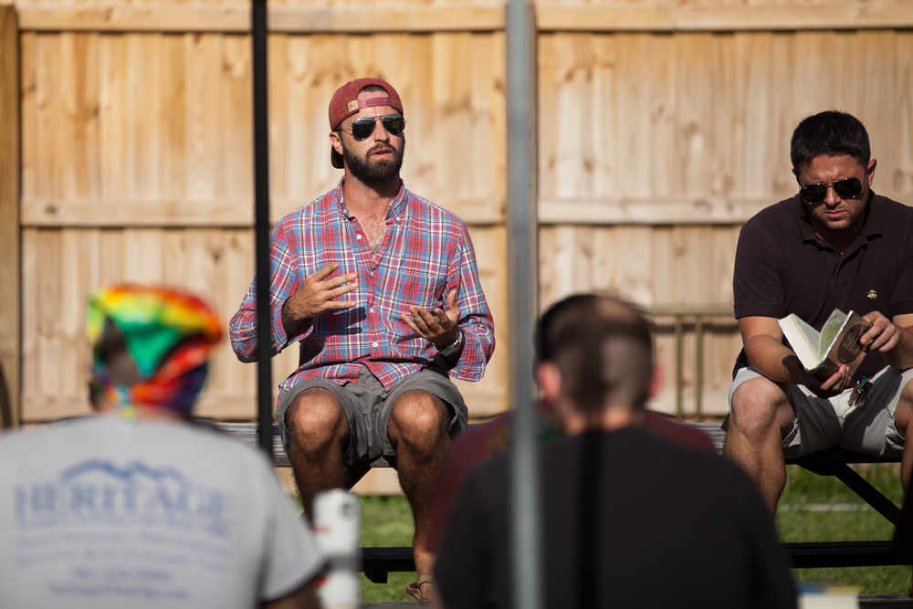 men gathered at Healing Properties during a recovery event