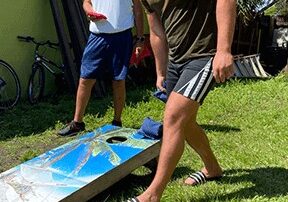 halfway-house-men-playing-cornhole-outdoor-recovery-activity-3 Healing Properties Sober Living Delray Beach Halfway House