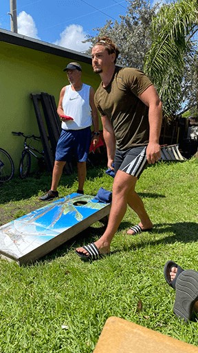 halfway-house-men-playing-cornhole-outdoor-recovery-activity-3 Healing Properties Sober Living Delray Beach Halfway House