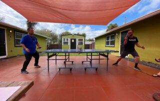 sober-living-ping-pong-tournament-delray-beach-05 Healing Properties Sober Living Delray Beach Halfway House